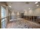 Bright living room showcasing exposed interior walls and modern recessed lighting at 2305 S Hesperides St, Tampa, FL 33629