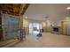 Spacious living area with fireplace in progress showing interior renovations at 2305 S Hesperides St, Tampa, FL 33629