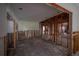 Wide-open living room with exposed framing and in-progress remodel at 2305 S Hesperides St, Tampa, FL 33629