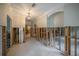 Open-concept living space in remodel, with exposed wall studs and ample natural light at 2305 S Hesperides St, Tampa, FL 33629