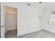 Bedroom featuring walk-in closet and neutral walls at 2401 Havana Dr, Clearwater, FL 33764