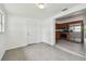 Charming dining area situated next to a kitchen featuring modern tile flooring and natural light at 2401 Havana Dr, Clearwater, FL 33764