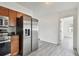 Bright kitchen features stainless steel appliances, granite countertops, and wood cabinets at 2401 Havana Dr, Clearwater, FL 33764