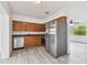Kitchen featuring stainless steel appliances, and wood cabinets at 2401 Havana Dr, Clearwater, FL 33764