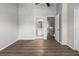 Bedroom features wood floors, ceiling fan, and ensuite bathroom at 273 Countryside Key Blvd, Oldsmar, FL 34677