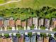 An aerial view shows the properties along the street highlighting the mature trees and well-kept landscaping at 3148 Sago Point Ct, Land O Lakes, FL 34639