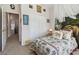 Bright bedroom featuring an accent wall and ample closet space at 3148 Sago Point Ct, Land O Lakes, FL 34639