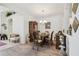 Formal dining room with a wooden table set for a meal at 3148 Sago Point Ct, Land O Lakes, FL 34639