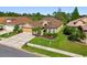 Well-maintained single-story home with a two-car garage and beautiful landscaping at 3148 Sago Point Ct, Land O Lakes, FL 34639