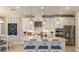 Modern kitchen with stainless steel appliances, ample counter space, and stylish pendant lighting at 3410 Lumber Falls Dr, Plant City, FL 33565