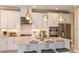 Modern kitchen with stainless steel appliances, ample counter space, and stylish pendant lighting at 3410 Lumber Falls Dr, Plant City, FL 33565