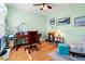 Bright office space featuring hardwood floors, a comfortable workspace, and natural light for productivity at 3434 Tarbolton Way, Land O Lakes, FL 34638