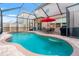 Inviting screened-in pool with brick surround, outdoor seating, and plenty of sunshine for relaxation and recreation at 3434 Tarbolton Way, Land O Lakes, FL 34638