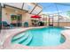 Enjoy outdoor living with this sparkling pool and screened lanai, perfect for relaxation and entertaining at 3434 Tarbolton Way, Land O Lakes, FL 34638