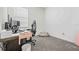 Office space features a modern desk, ergonomic chair, and neutral decor at 37587 Mackenzie Dr, Zephyrhills, FL 33540