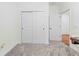 Clean bedroom with closet and neutral carpeted flooring for versatile use at 37587 Mackenzie Dr, Zephyrhills, FL 33540