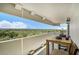 Balcony featuring a table and chairs, perfect for enjoying the stunning treetop views at 4141 Bayshore Blvd # 1204, Tampa, FL 33611
