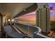 Relaxing on the condo balcony provides sunset water views from the unit at 4141 Bayshore Blvd # 1204, Tampa, FL 33611