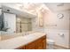 Bathroom features glass shower, wooden vanity, and decorative lighting at 4141 Bayshore Blvd # 1204, Tampa, FL 33611
