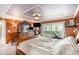 Bedroom with dresser, TV, and balcony access at 4141 Bayshore Blvd # 1204, Tampa, FL 33611