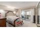 Cozy bedroom with balcony access, plush carpet and natural light at 4141 Bayshore Blvd # 1204, Tampa, FL 33611
