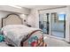Comfortable bedroom with natural light, sliding glass doors to balcony at 4141 Bayshore Blvd # 1204, Tampa, FL 33611