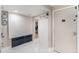 Hallway with white tile floors and built-in storage at 4141 Bayshore Blvd # 1204, Tampa, FL 33611
