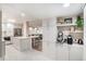 Spacious kitchen with white cabinetry and stainless steel appliances at 4141 Bayshore Blvd # 1204, Tampa, FL 33611