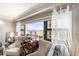 Sitting area with chairs and a side table offers a cozy spot with a scenic water view at 4141 Bayshore Blvd # 1204, Tampa, FL 33611