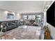 Bright living room featuring a large window with stunning views and elegant furnishings at 4141 Bayshore Blvd # 1204, Tampa, FL 33611