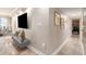 Beautiful living room and hallway with nice floors and good natural lighting at 4141 Bayshore Blvd # 1204, Tampa, FL 33611