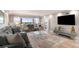 Bright living room featuring a large window with stunning views and elegant furnishings at 4141 Bayshore Blvd # 1204, Tampa, FL 33611