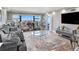 Bright living room featuring a large window with stunning views and elegant furnishings at 4141 Bayshore Blvd # 1204, Tampa, FL 33611