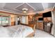 Spacious main bedroom features detailed ceiling, decorative molding and ornate furniture at 4141 Bayshore Blvd # 1204, Tampa, FL 33611