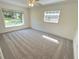Bright bedroom with plush carpeting, and lots of natural light at 4310 Lithia Pinecrest Rd, Valrico, FL 33596