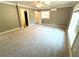 Large bedroom with plush carpet and lots of natural light at 4310 Lithia Pinecrest Rd, Valrico, FL 33596