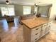 Open concept living room with large windows and ceramic tile flooring at 4310 Lithia Pinecrest Rd, Valrico, FL 33596
