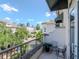 Serene balcony with seating area offers views of the neighborhood and city skyline at 450 Knights Run Ave # 414, Tampa, FL 33602