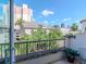 Balcony with city views, lush landscaping, and comfortable seating at 450 Knights Run Ave # 414, Tampa, FL 33602