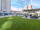 Lounge area with green space, seating and overhead coverings at 450 Knights Run Ave # 414, Tampa, FL 33602
