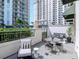 Outdoor patio features comfortable seating with skyline views at 450 Knights Run Ave # 414, Tampa, FL 33602