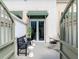 Private outdoor patio space with seating and decorative plants, offering a serene and inviting atmosphere at 450 Knights Run Ave # 414, Tampa, FL 33602