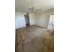 Spacious bedroom featuring a ceiling fan and ample closet space at 4715 Bay Ne St # 235, St Petersburg, FL 33703