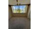Bright Florida room with sliding windows overlooking pool and palms at 4715 Bay Ne St # 235, St Petersburg, FL 33703