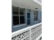 Exterior view of unit #235, showcases the private entrance with balcony in a neutral palette at 4715 Bay Ne St # 235, St Petersburg, FL 33703