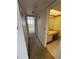 Hallway leading to a bathroom and bedroom with multiple closet spaces at 4715 Bay Ne St # 235, St Petersburg, FL 33703