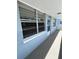 Exterior walkway leading to a unit's door, featuring neutral tones and clean design for a welcoming approach at 4715 Bay Ne St # 235, St Petersburg, FL 33703