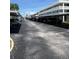 Outdoor parking area with covered carports for residents of this condominium community in a clean and organized setting at 4715 Bay Ne St # 235, St Petersburg, FL 33703