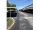 Clean and well-maintained outdoor parking area with covered carports for residents of this condominium community at 4715 Bay Ne St # 235, St Petersburg, FL 33703