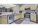 Well-appointed kitchen with stainless steel appliances, ample counter space, and modern fixtures at 4921 Barnstead Dr, Riverview, FL 33578